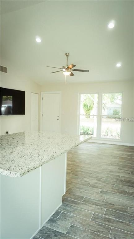 3409 Vidal Street New Port Richey, FL 34655 - Photo 5 of 8 a view of a kitchen with a sink and a window
