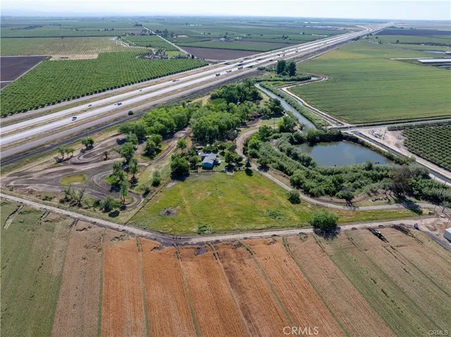 a view of a playground with basketball court