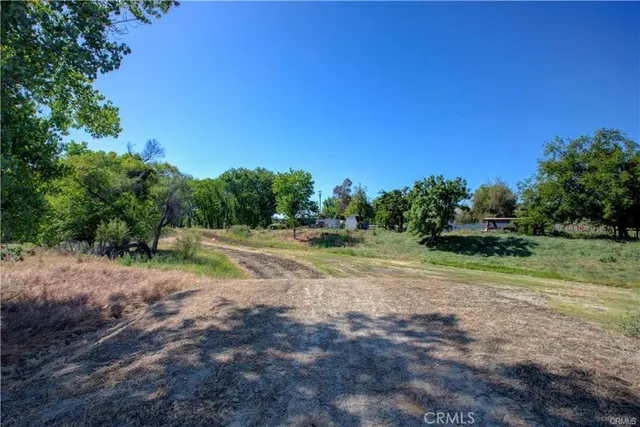a view of a playground with basketball court