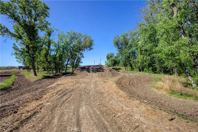 a view of outdoor space with playground and green space