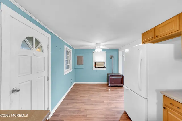 a kitchen with a stove and a microwave