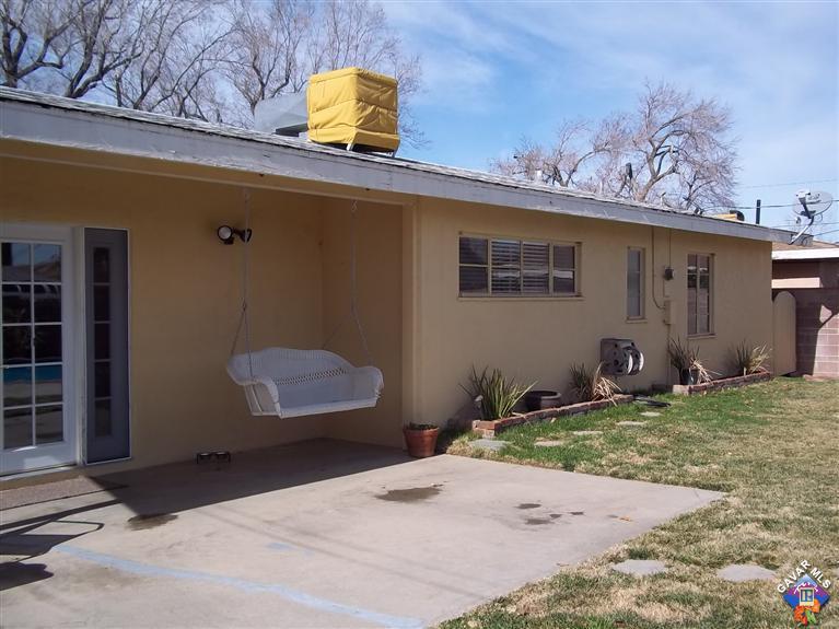 43940 3rd Street East Lancaster, CA 93535 - Photo 4 of 18 a house view with a backyard space