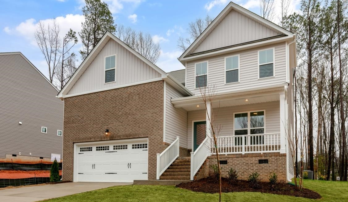 195 Madden Rose Loop Garner, NC 27529 - Photo 2 of 37 a view of a house with a yard