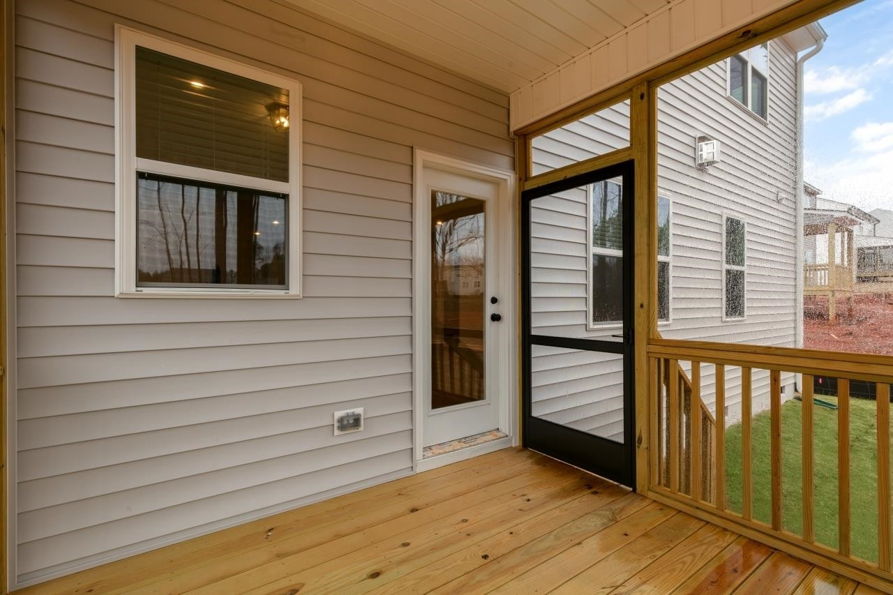 195 Madden Rose Loop Garner, NC 27529 - Photo 21 of 37 a view of front door and porch