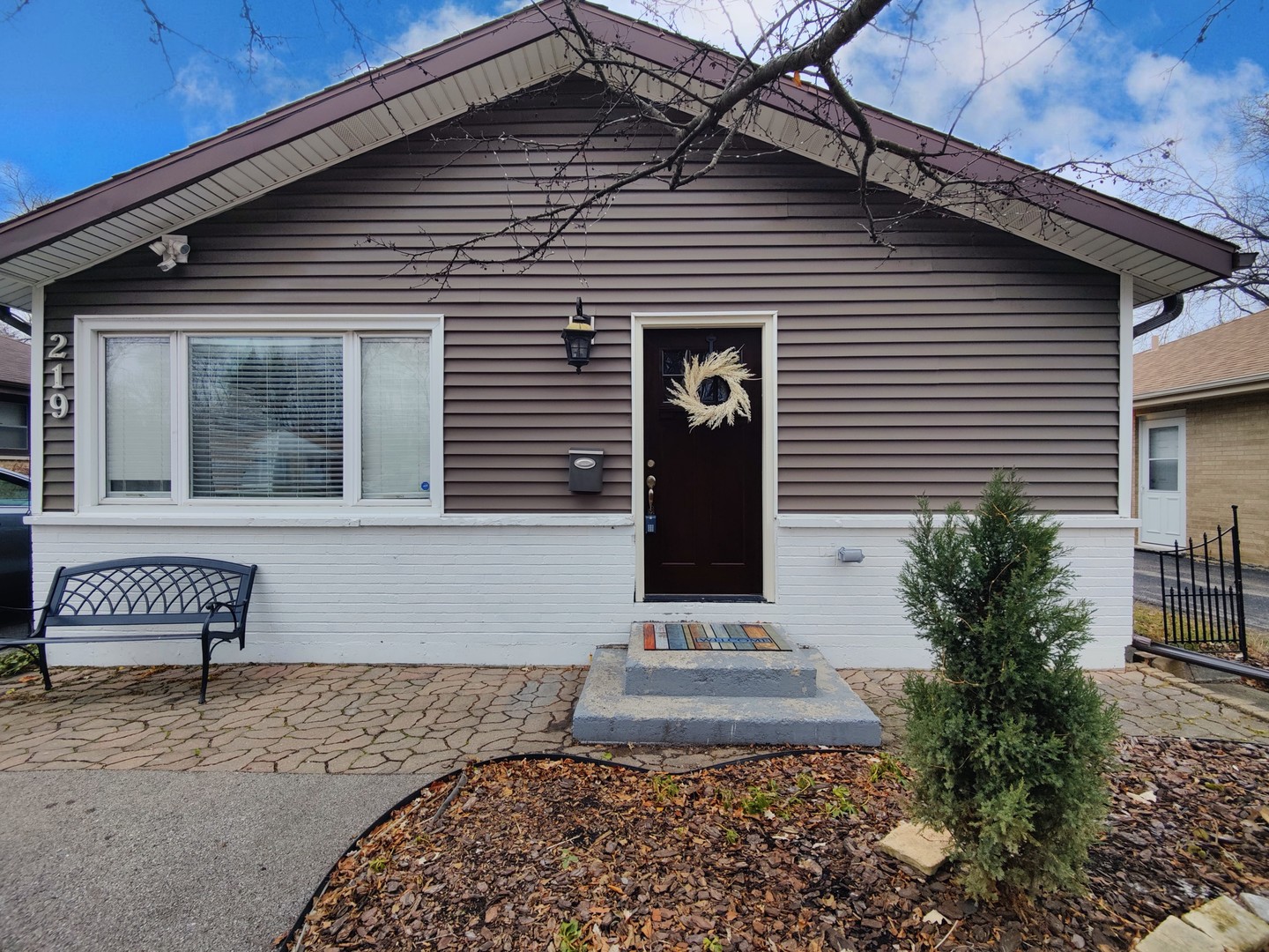 a front view of a house with a garage
