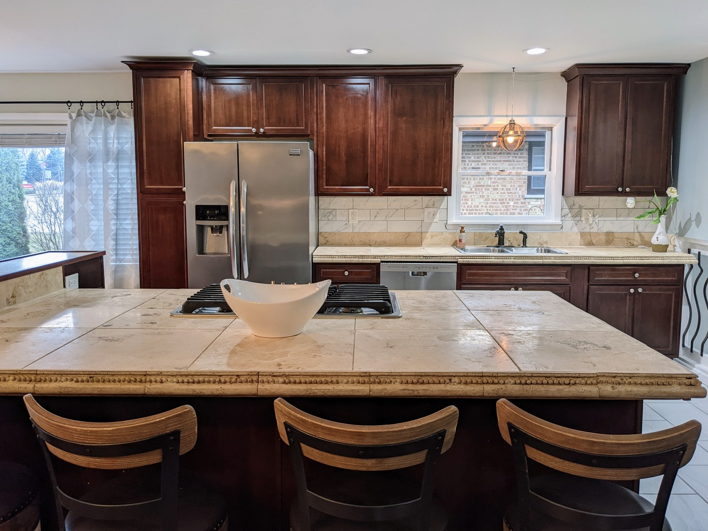 219 North Butterfield Road Libertyville, IL 60048 - Photo 5 of 14 a kitchen with a table and chairs