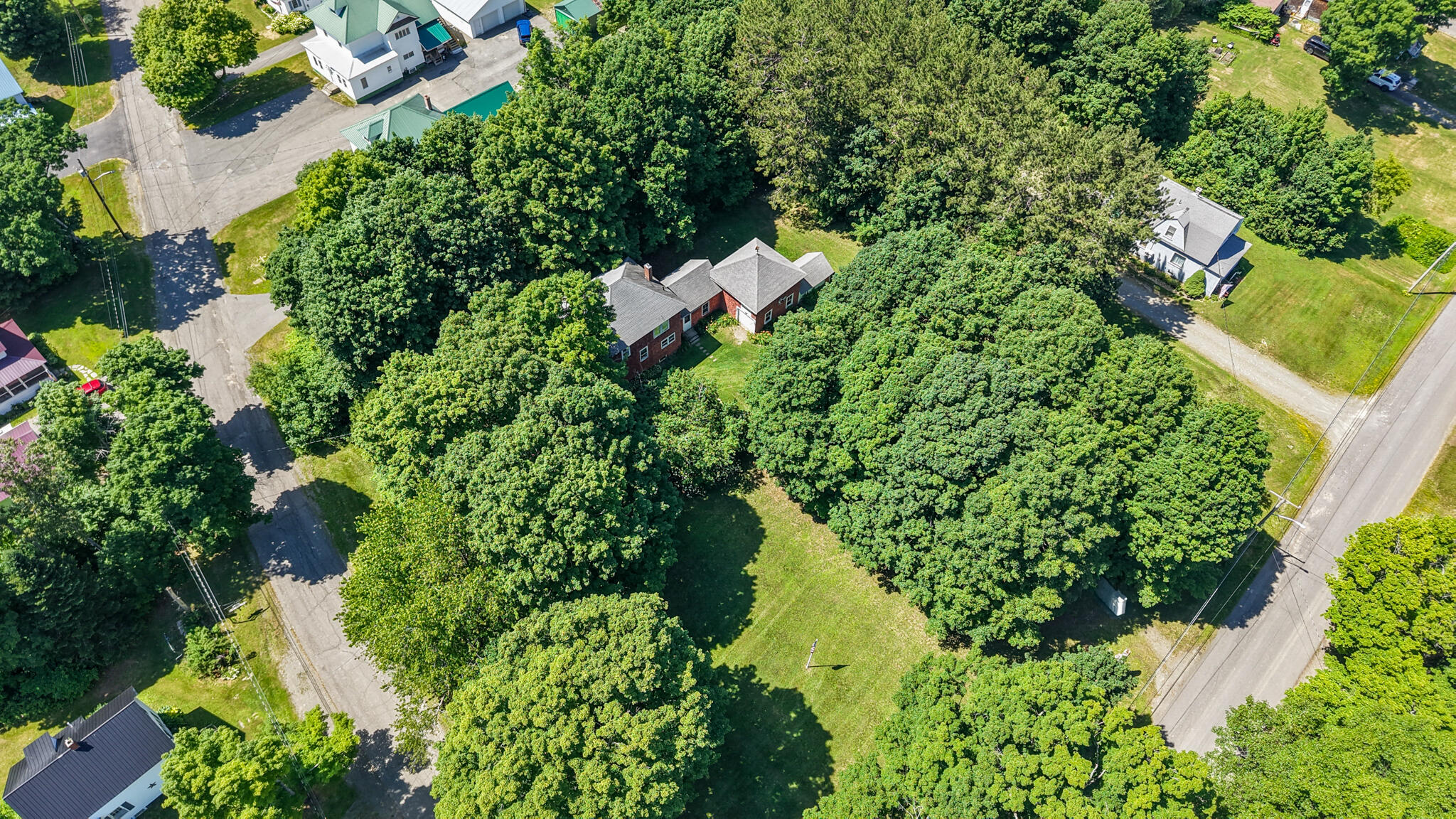32 Willow Street Patten, ME 04765 - Photo 12 of 36 dji_fly_20260712_135948_0749_17838794670