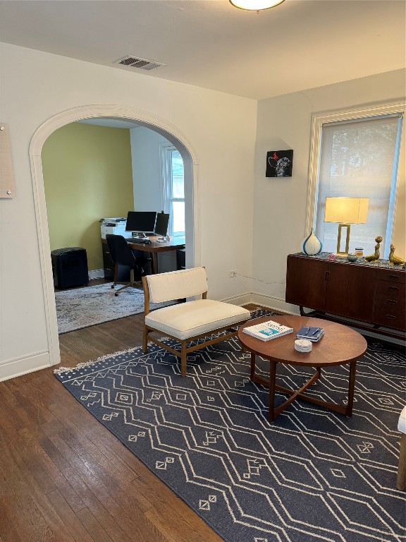 1308 Navasota Street Austin, TX 78702 - Photo 6 of 14 a living room with furniture and a rug