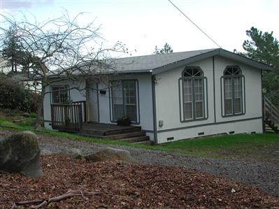 10837 Cherry Ridge Road Sebastopol, CA 95472 - Photo 2 of 4 a view of a house with a yard