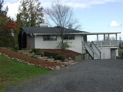 10837 Cherry Ridge Road Sebastopol, CA 95472 - Photo 3 of 4 a view of a house with a yard