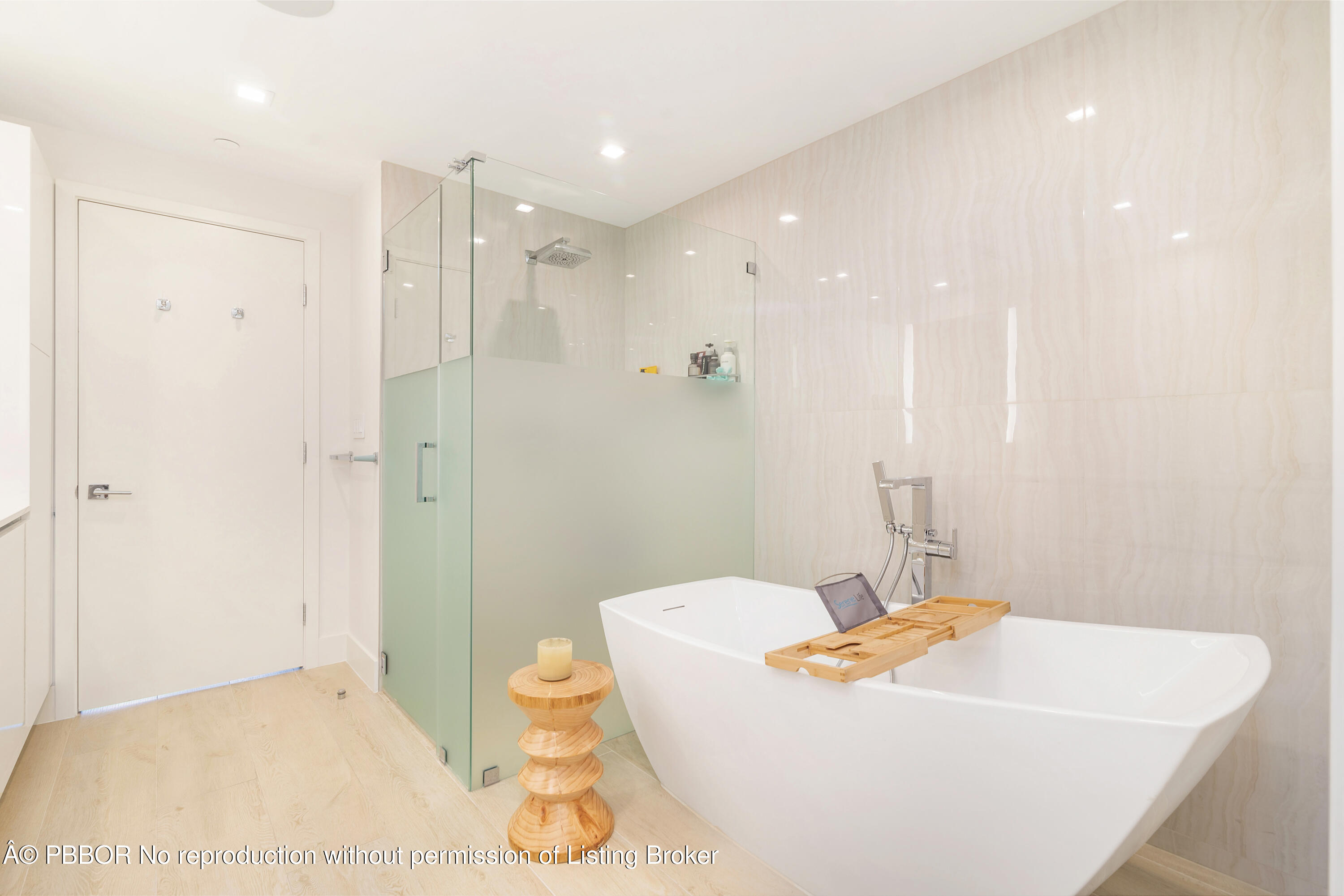 150 Inlet Way, Unit 1E Palm Beach Shores, FL 33404 - Photo 18 of 41 a bathroom with a sink a toilet and shower