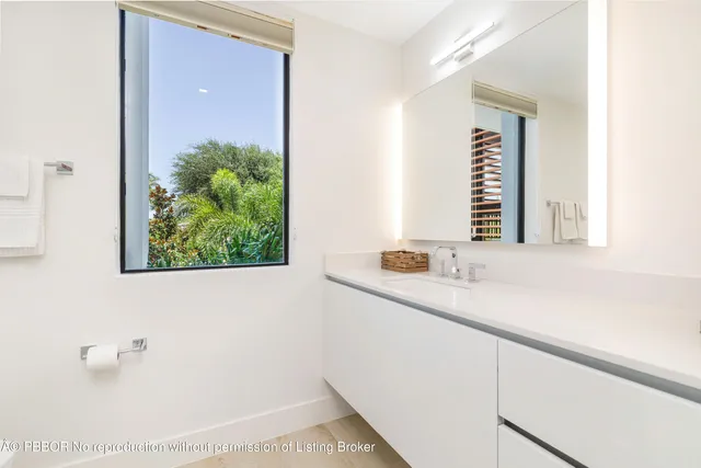 a bathroom with a bathtub and a sink