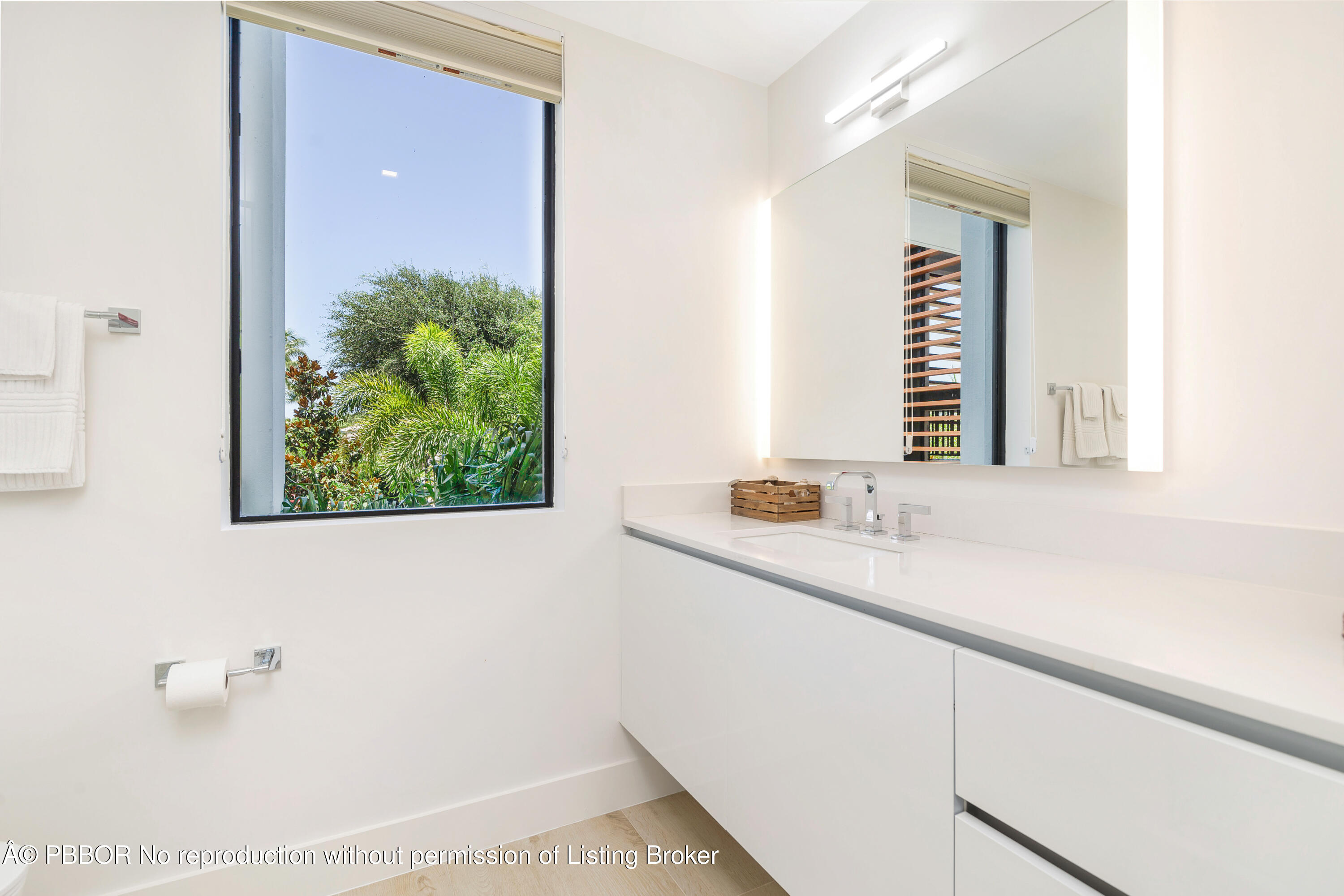 150 Inlet Way, Unit 1E Palm Beach Shores, FL 33404 - Photo 24 of 41 a bathroom with a bathtub and a sink
