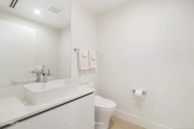a bathroom with a sink and a toilet
