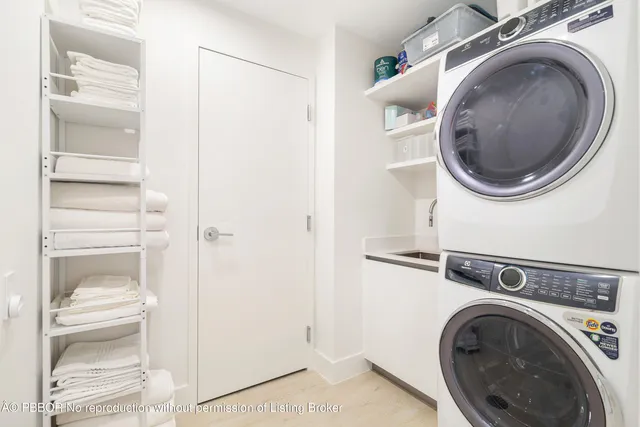 a close view of a utility room with washer and dryer