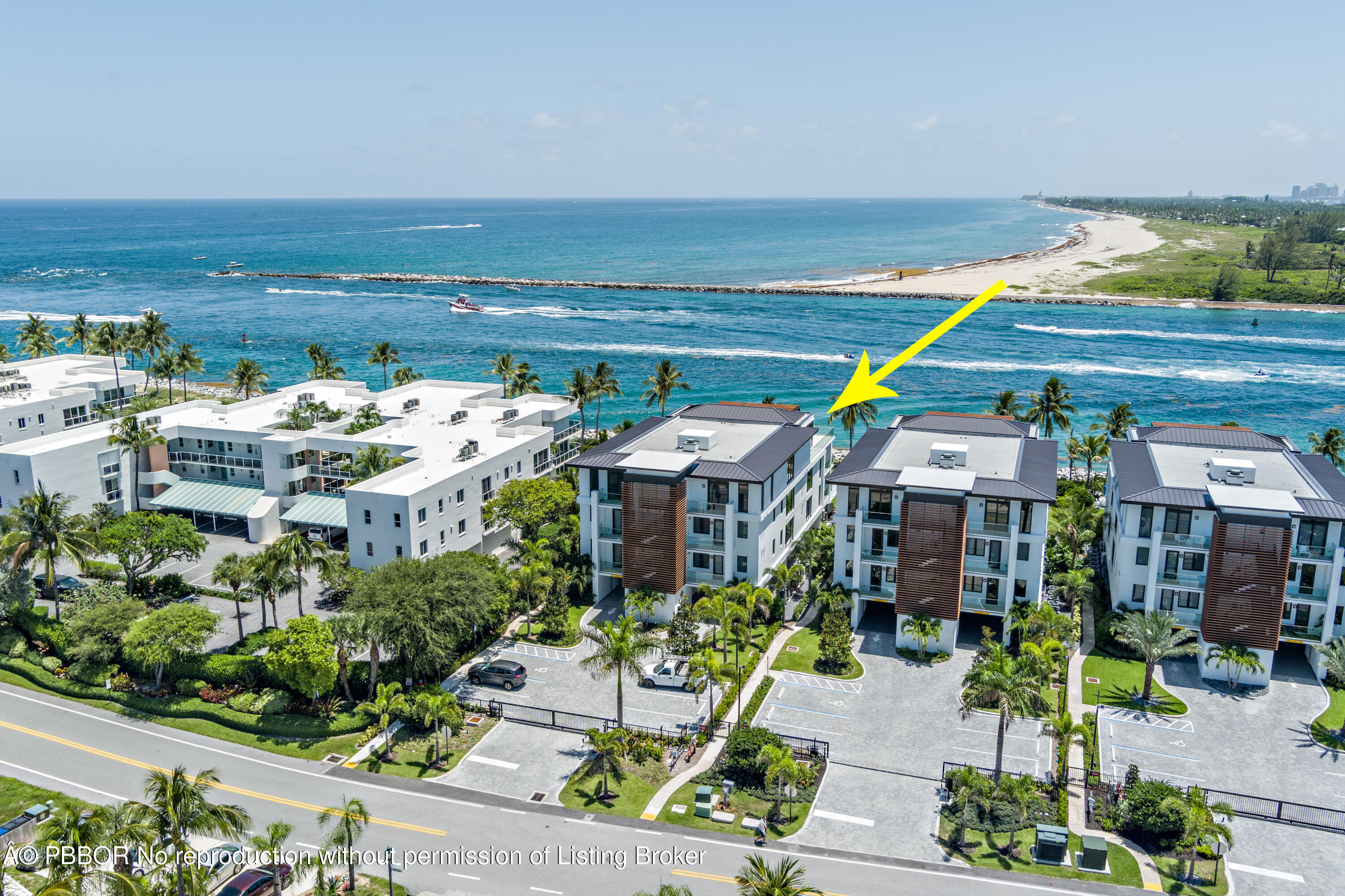 150 Inlet Way, Unit 1E Palm Beach Shores, FL 33404 - Photo 37 of 41 a view of a backyard with plants