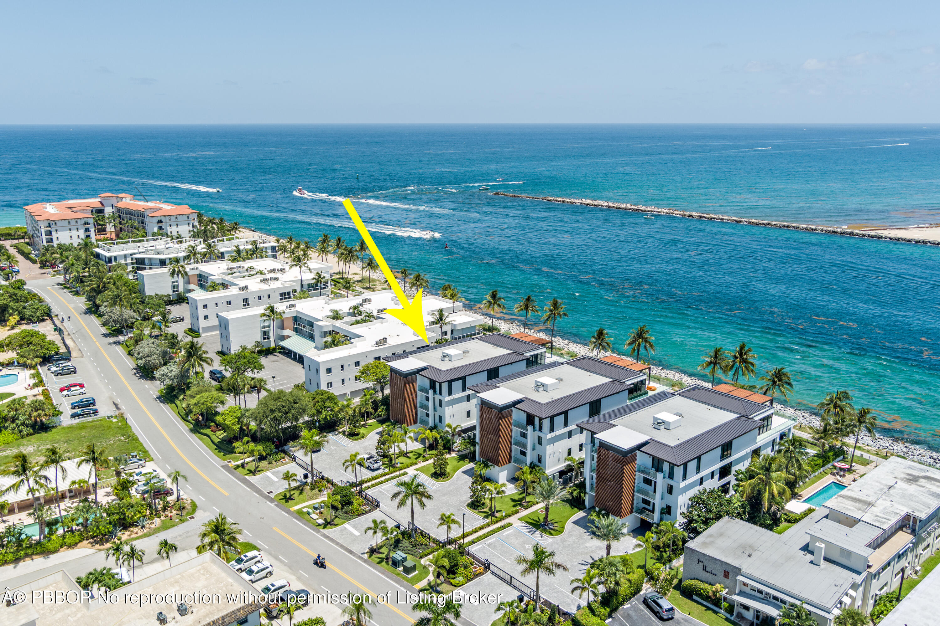 150 Inlet Way, Unit 1E Palm Beach Shores, FL 33404 - Photo 39 of 41 an aerial view of a house with a ocean view