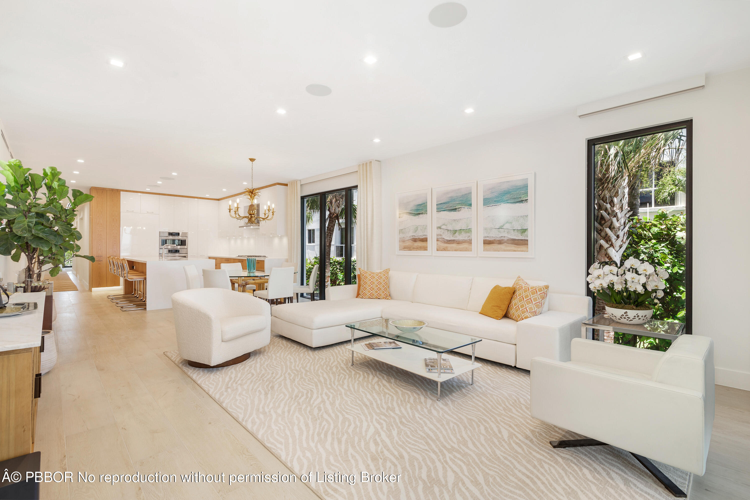 150 Inlet Way, Unit 1E Palm Beach Shores, FL 33404 - Photo 7 of 41 a living room with furniture and a large window