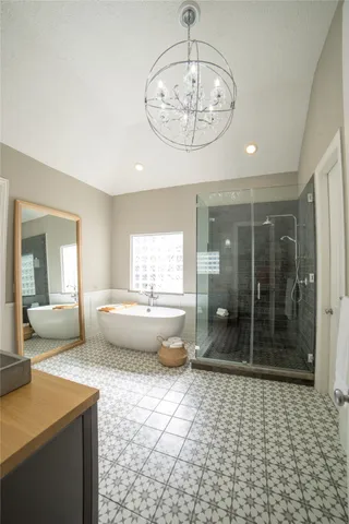 a white bath tub sitting in a bathroom
