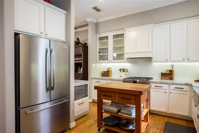 a kitchen with a sink and a window