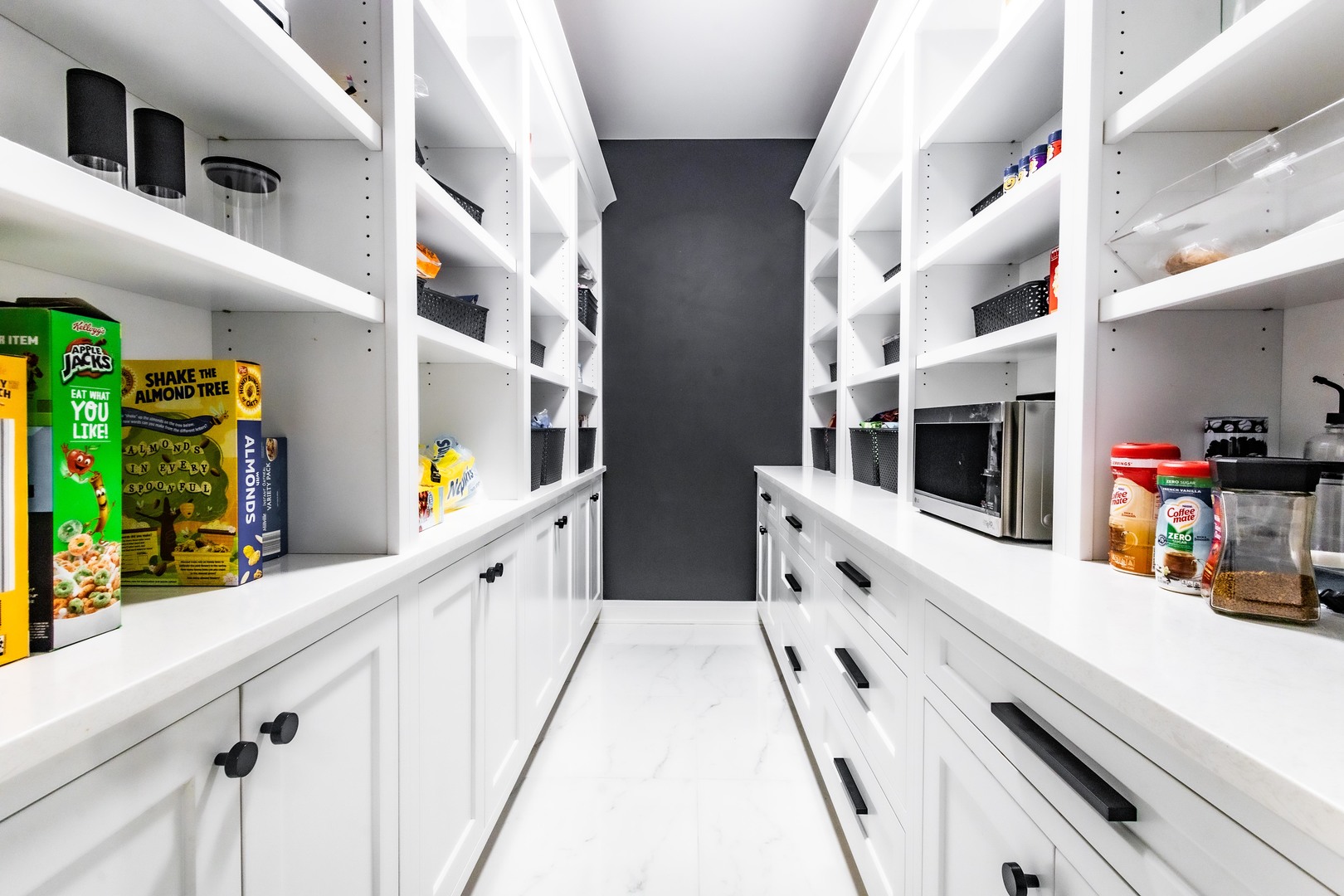 740 67th Place Willowbrook, IL 60527 - Photo 17 of 47 a large white kitchen with stainless steel appliances granite countertop lots of counter top space