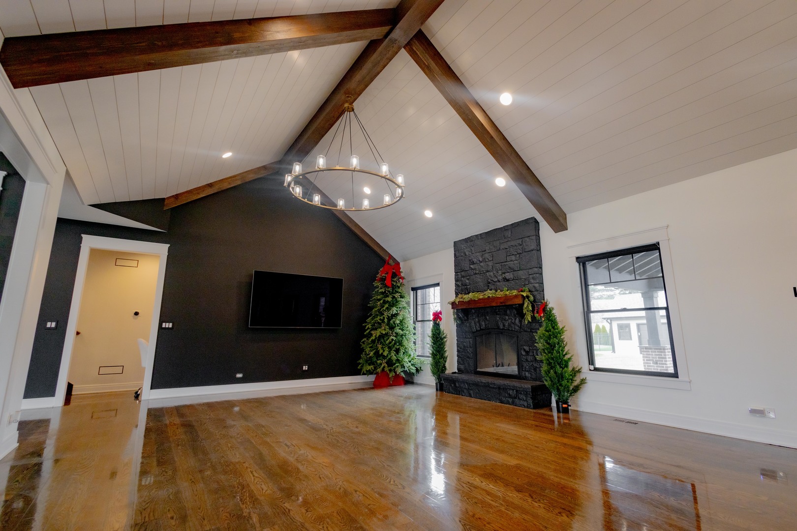 740 67th Place Willowbrook, IL 60527 - Photo 7 of 47 a living room with furniture and a flat screen tv