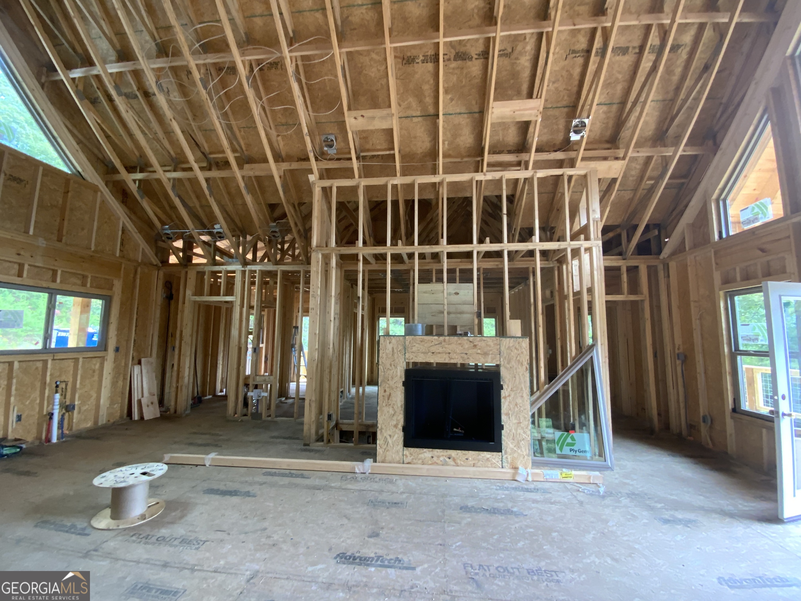 232 Red Tail Lane Morganton, GA 30560 - Photo 5 of 13 a view of a porch with a table and chairs and floor to ceiling window
