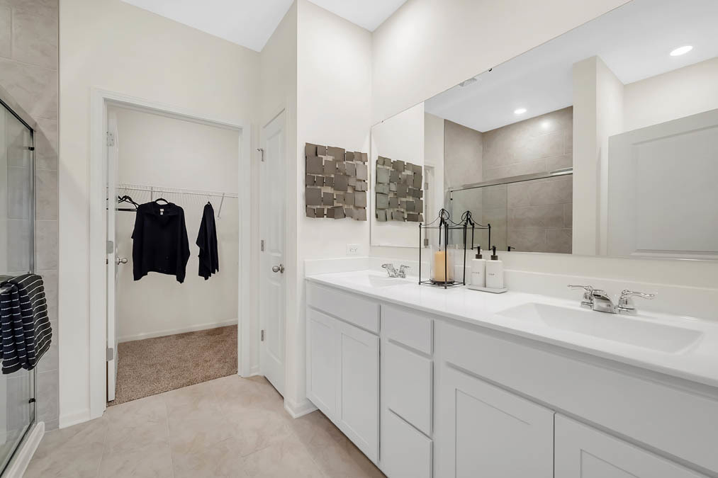 1122 Bluebell Lane Bartlett, IL 60103 - Photo 15 of 15 a bathroom with a sink and mirror