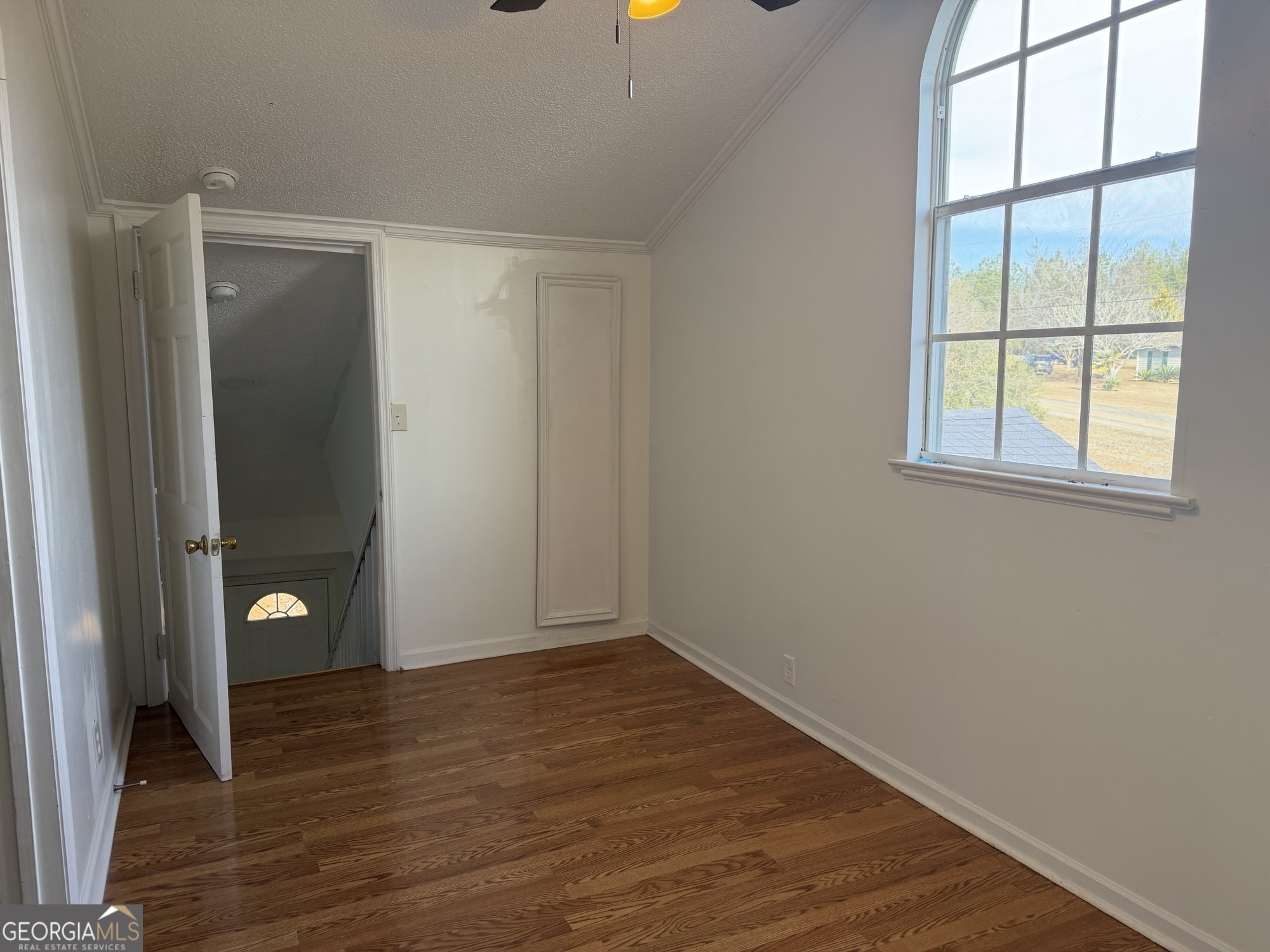 153 Wheehaw Road Macon, GA 31211 - Photo 25 of 28 wooden floor in an empty room with a window