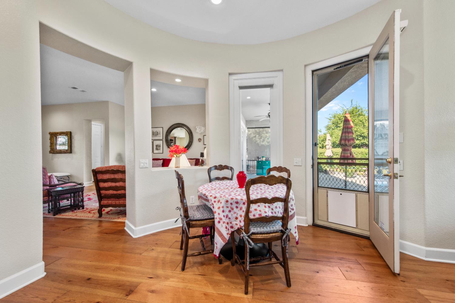 1146 Secret Lake Loop Lincoln, CA 95648 - Photo 15 of 61 a dining room with furniture window wooden floor