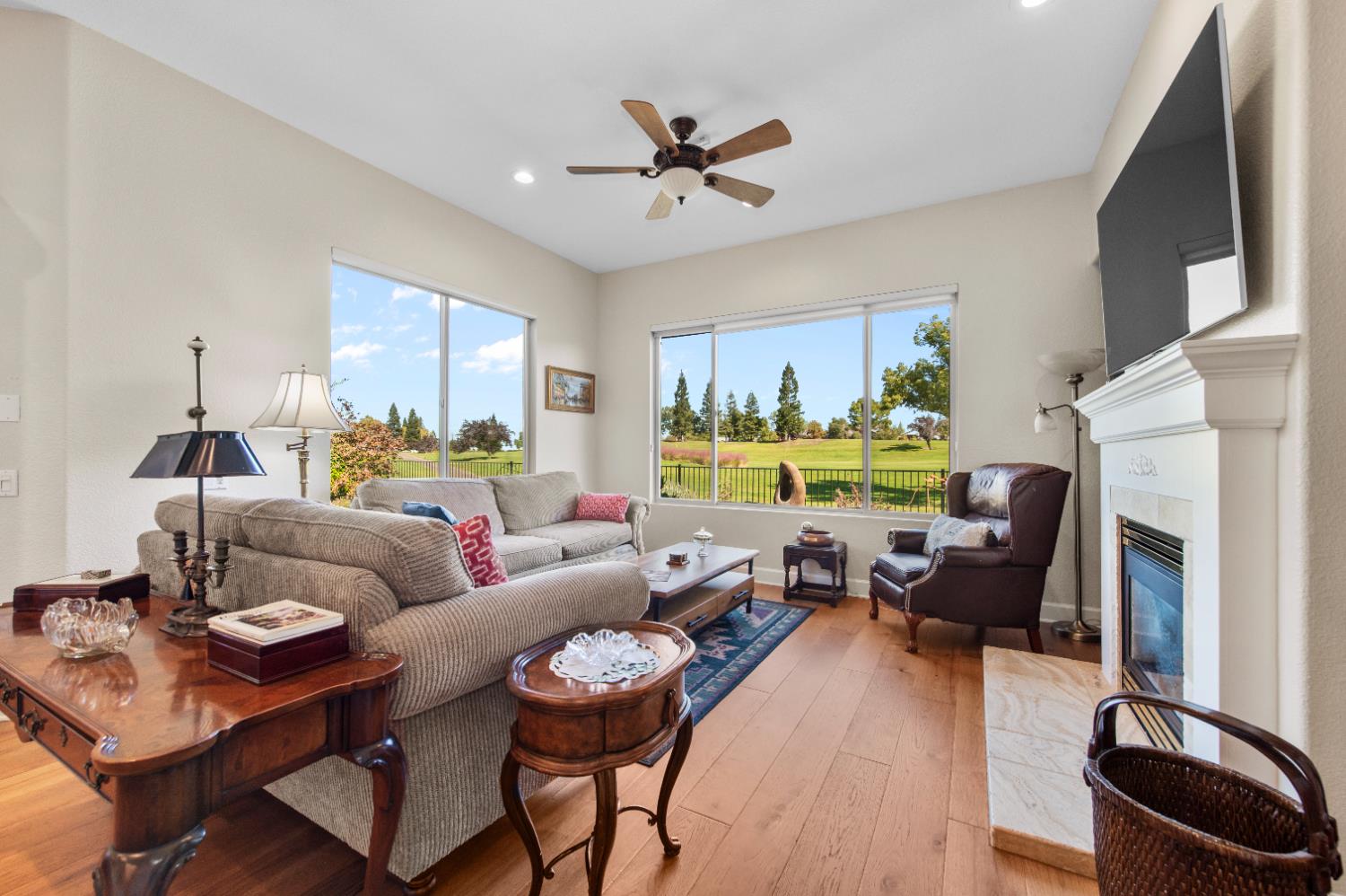 1146 Secret Lake Loop Lincoln, CA 95648 - Photo 17 of 61 a living room with furniture fireplace and a flat screen tv