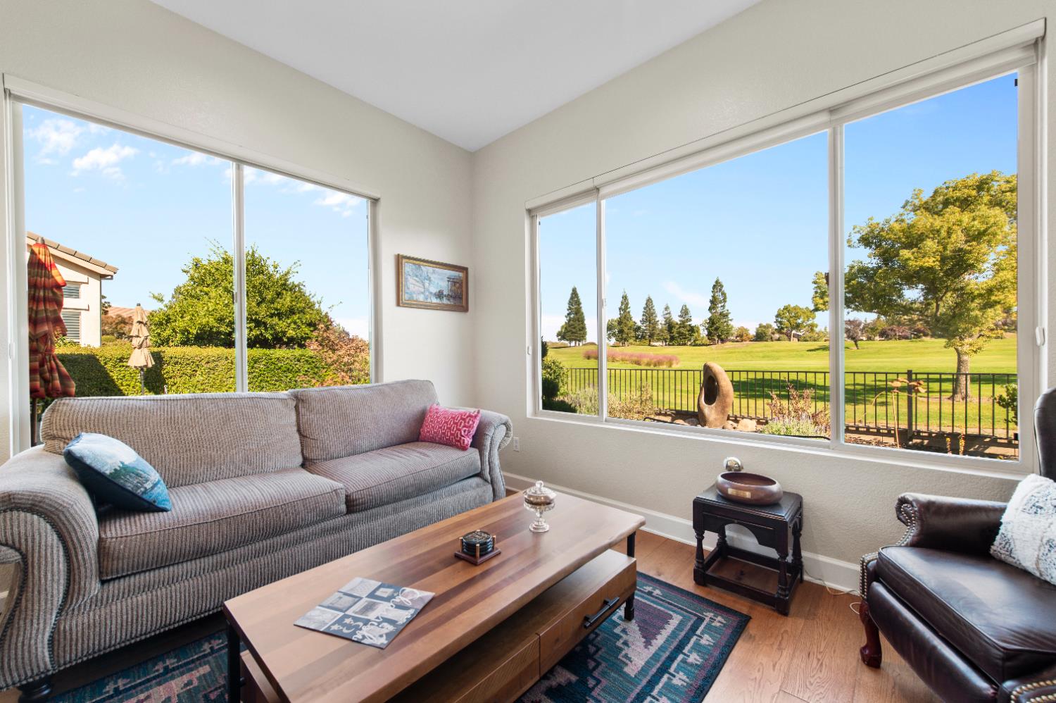 1146 Secret Lake Loop Lincoln, CA 95648 - Photo 19 of 61 a living room with furniture and a large window