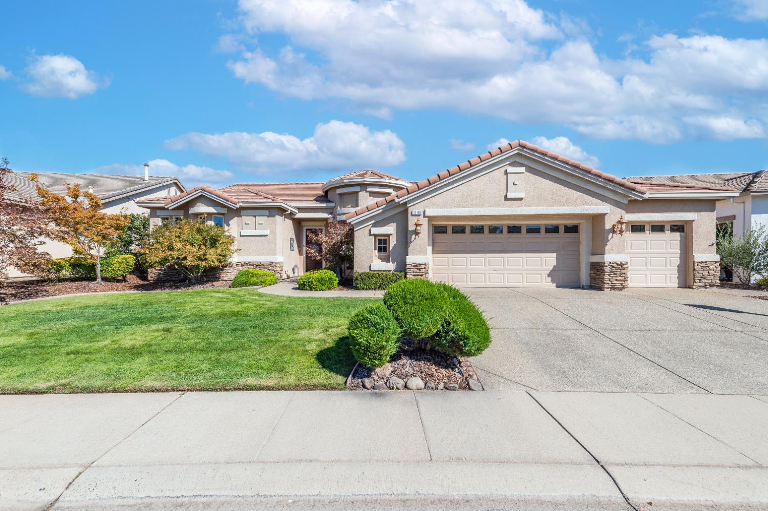 1146 Secret Lake Loop Lincoln, CA 95648 - Photo 2 of 61 a front view of a house with a garden