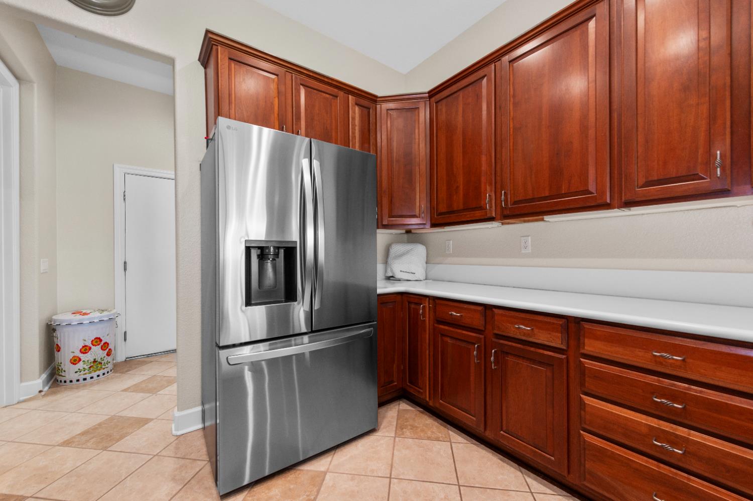 1146 Secret Lake Loop Lincoln, CA 95648 - Photo 26 of 61 a kitchen with stainless steel appliances granite countertop a refrigerator and a sink