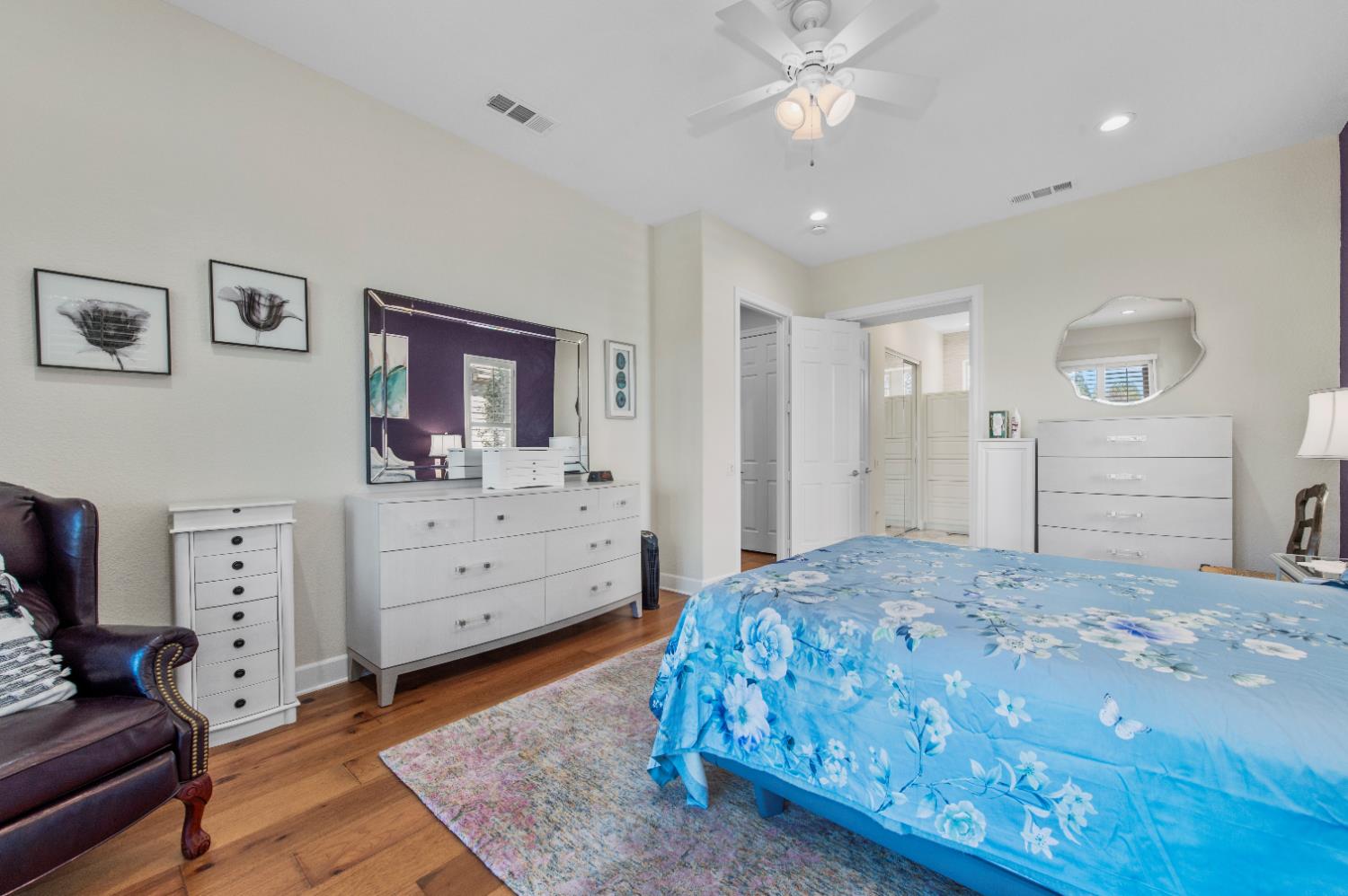 1146 Secret Lake Loop Lincoln, CA 95648 - Photo 40 of 61 a bedroom with a bed and a dresser in it