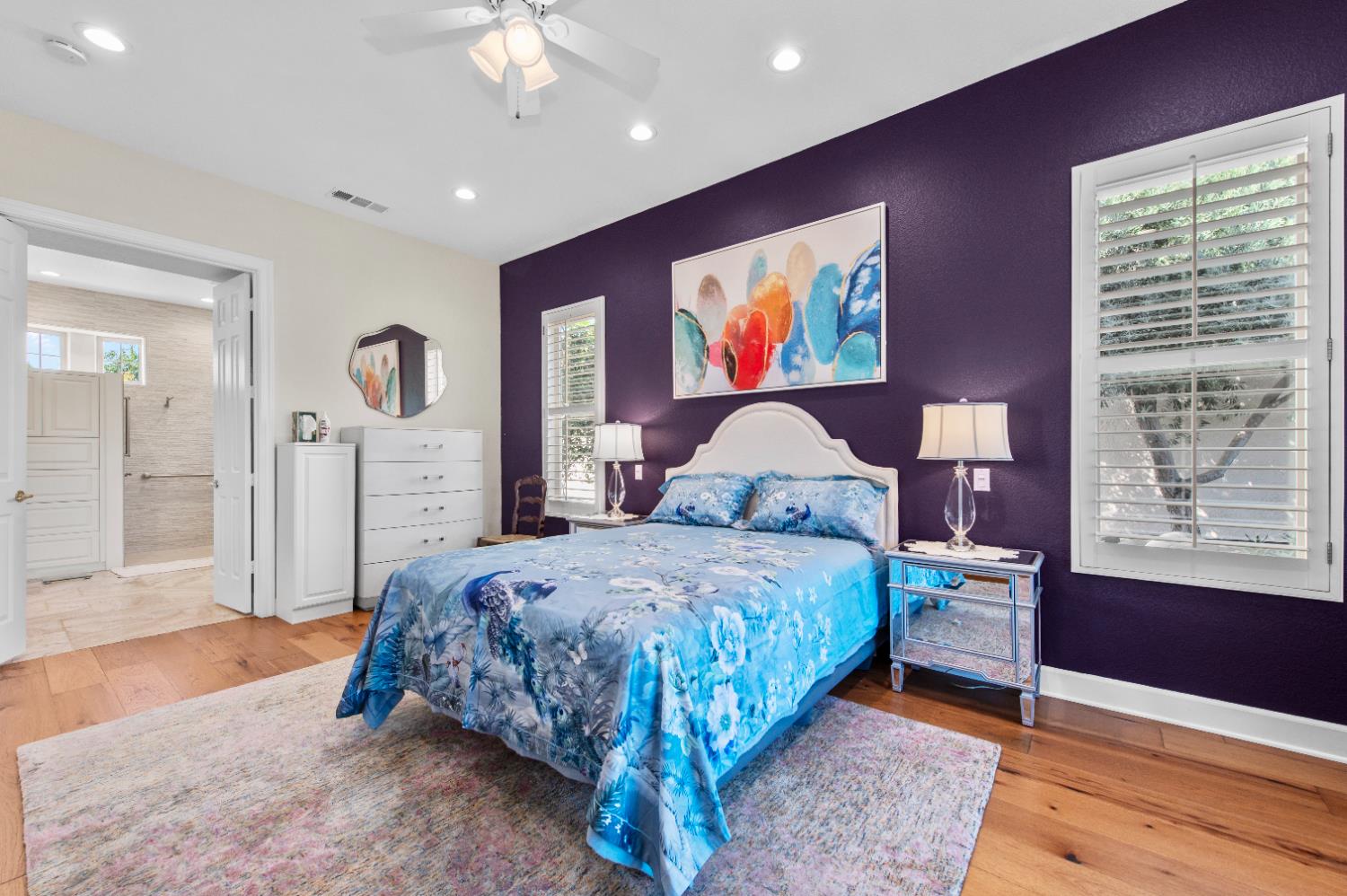 1146 Secret Lake Loop Lincoln, CA 95648 - Photo 41 of 61 a bedroom with a bed and a painting on the wall