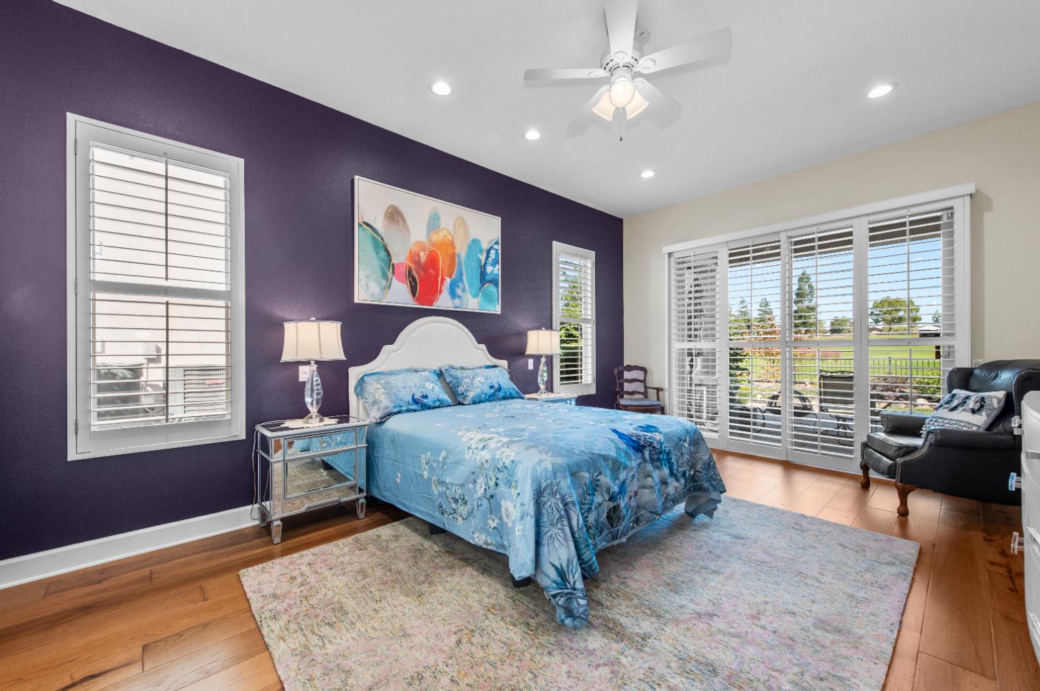 1146 Secret Lake Loop Lincoln, CA 95648 - Photo 42 of 61 a spacious bedroom with a bed a dresser and wooden floor