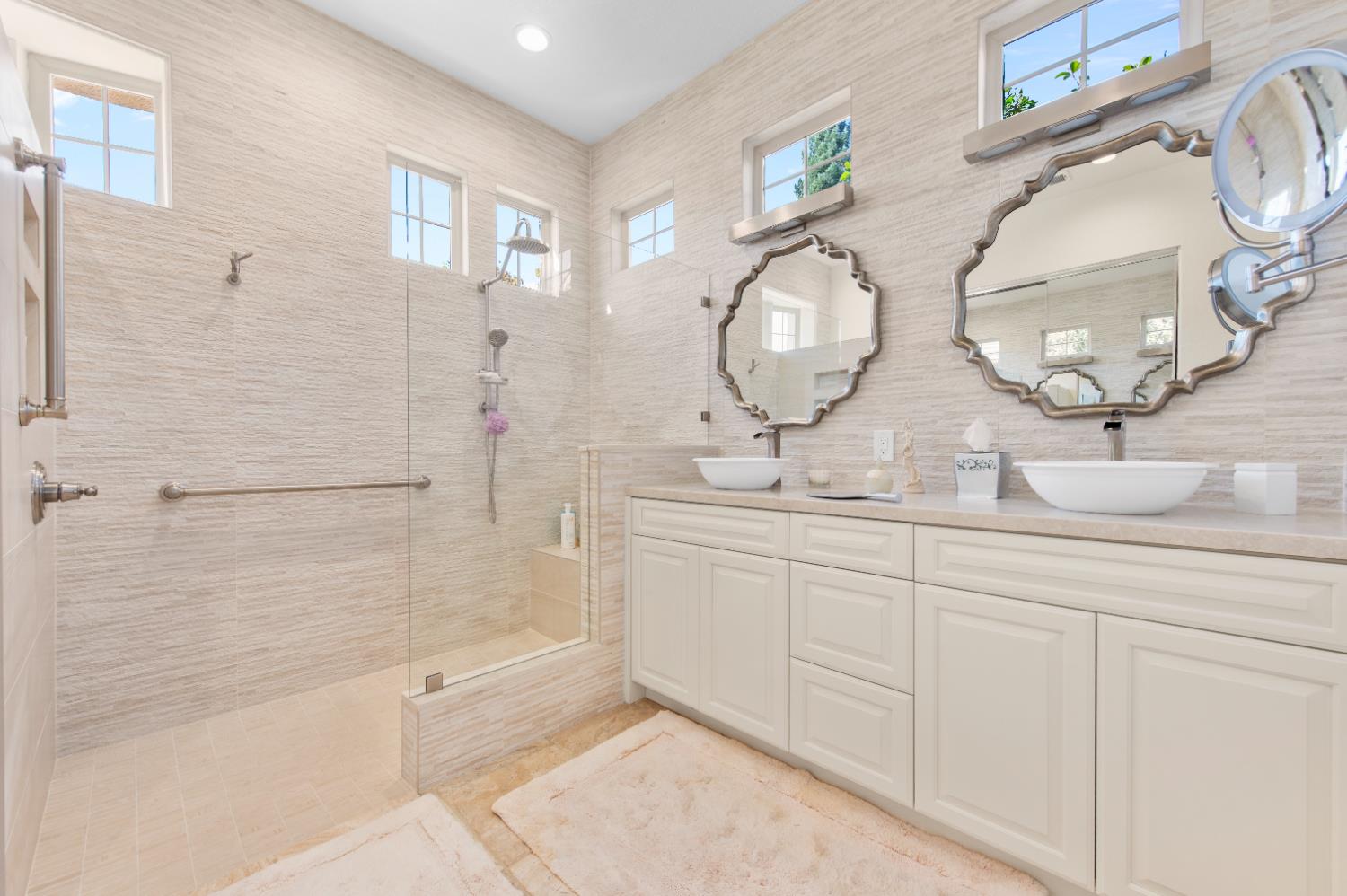 1146 Secret Lake Loop Lincoln, CA 95648 - Photo 46 of 61 a bathroom with a double vanity sink and a mirror