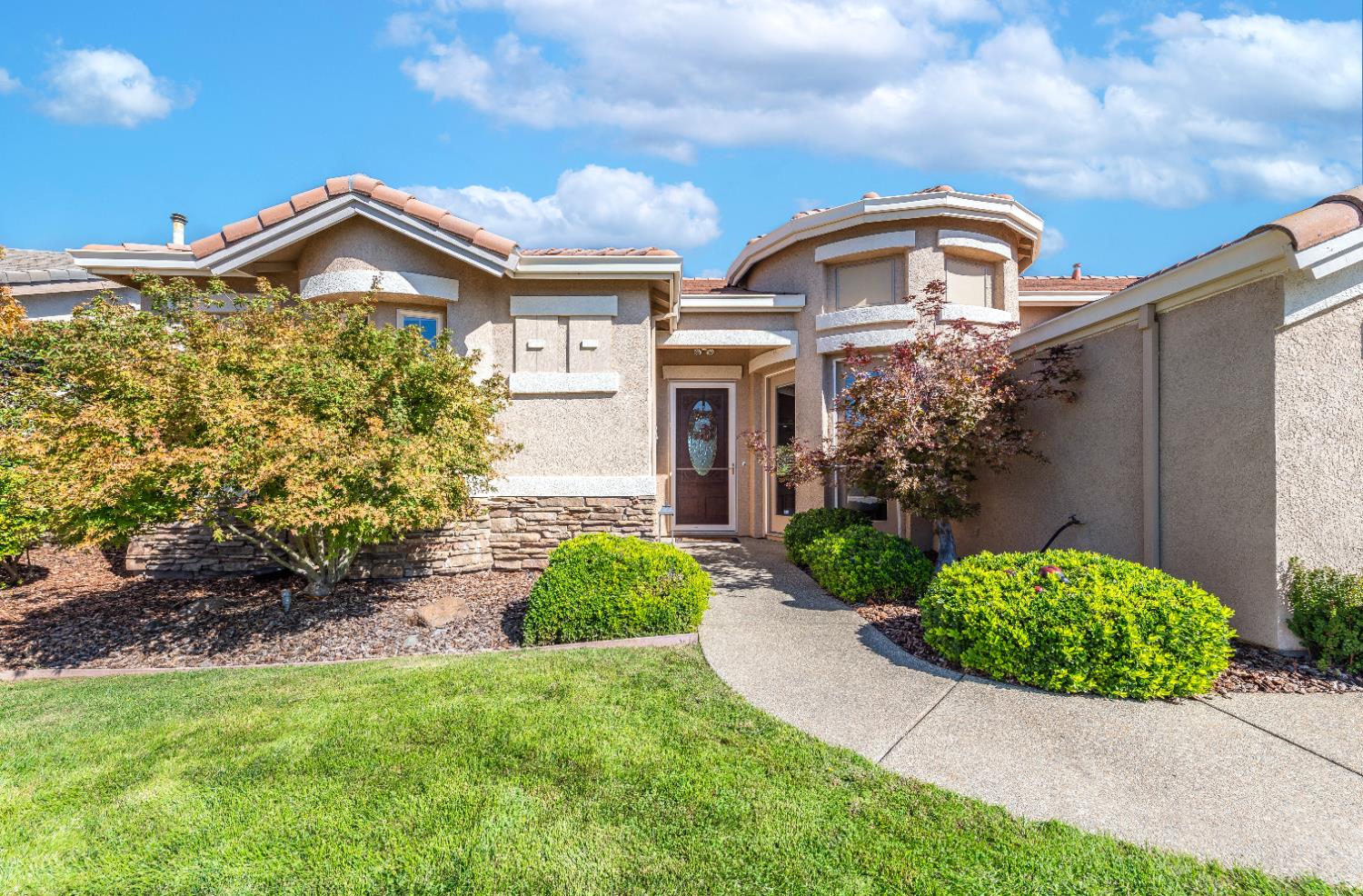 1146 Secret Lake Loop Lincoln, CA 95648 - Photo 49 of 61 a front view of a house with a garden