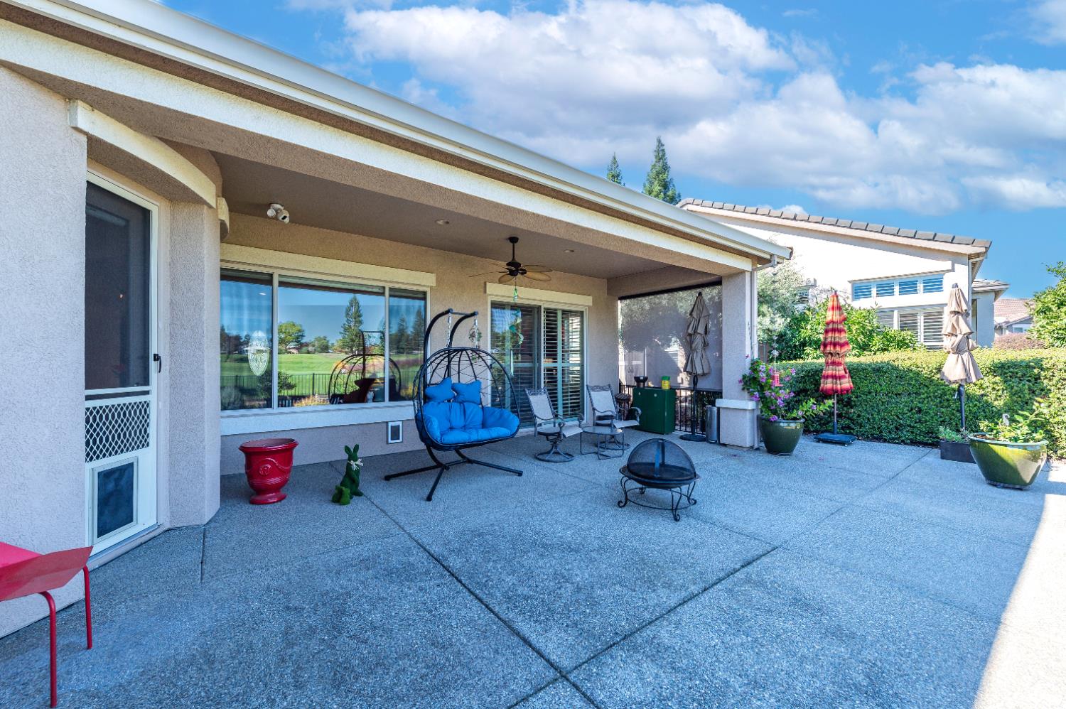 1146 Secret Lake Loop Lincoln, CA 95648 - Photo 54 of 61 a man sitting on a bench in front of a building