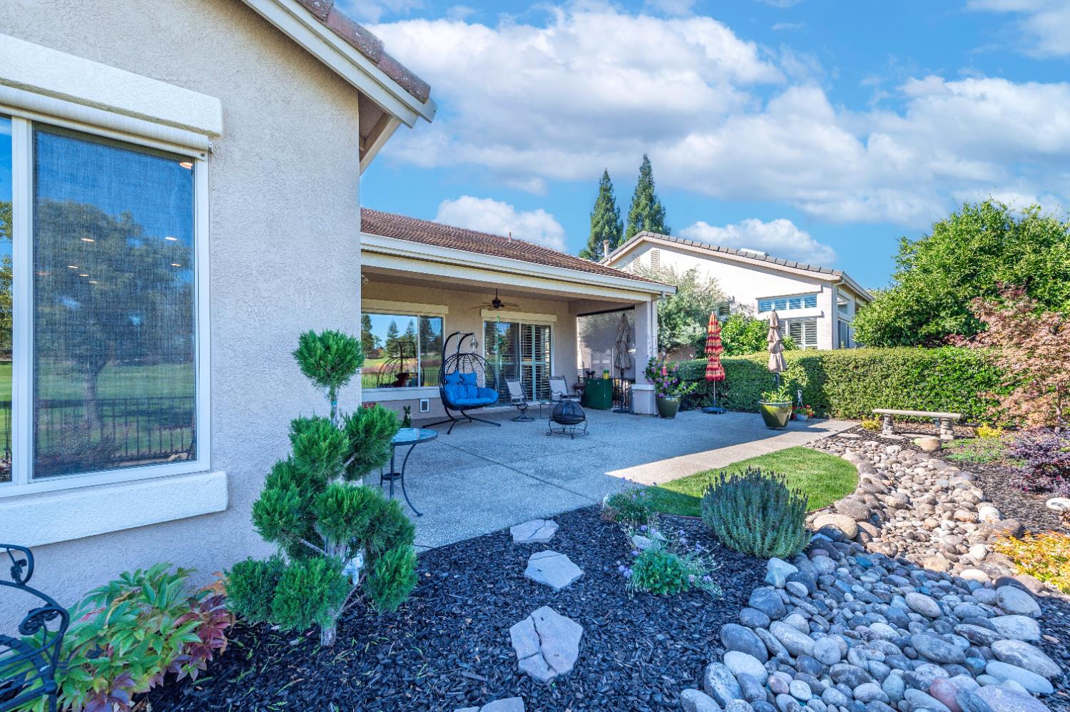 1146 Secret Lake Loop Lincoln, CA 95648 - Photo 55 of 61 a view of a house with backyard garden and plants