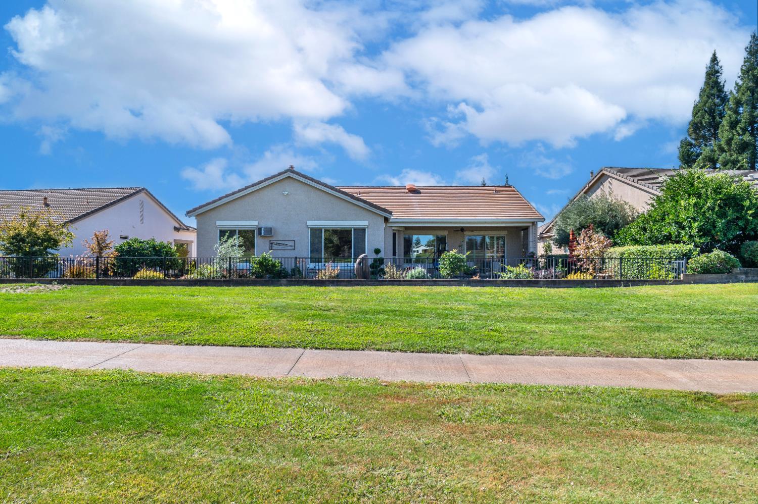 1146 Secret Lake Loop Lincoln, CA 95648 - Photo 61 of 61 a front view of house with yard and green space