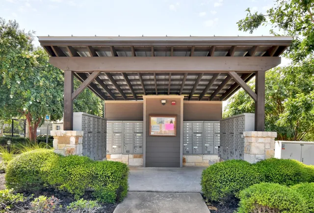 a front view of a house with a big yard