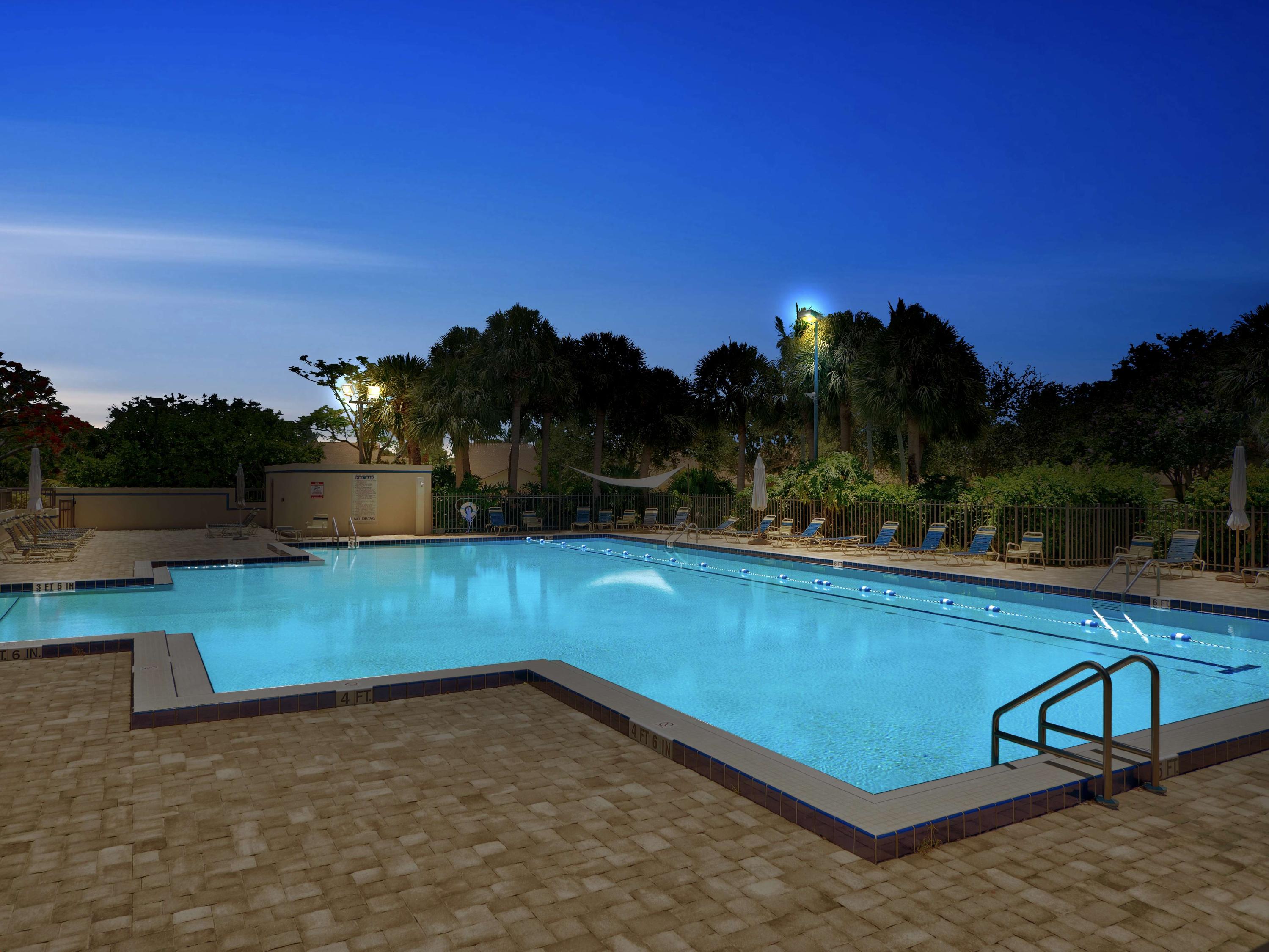 2425 24th Court Jupiter, FL 33477 - Photo 22 of 34 Nighttime Swimming
