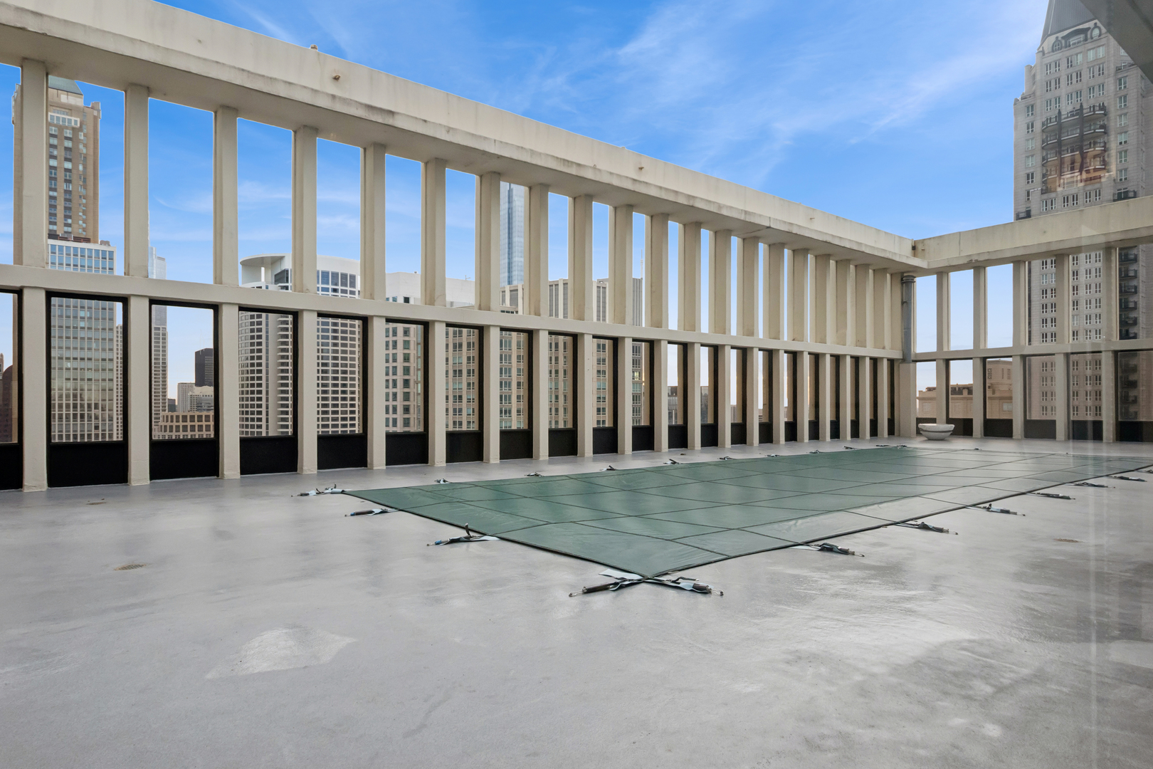 100 East Walton Street, Unit 18D Chicago, IL 60611 - Photo 15 of 20 a view of a backyard with porch
