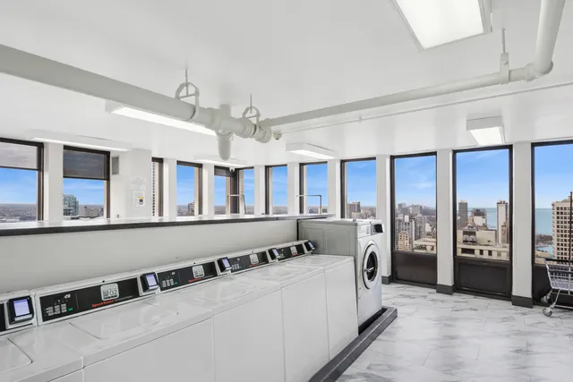 a bathroom with a shower and a sink