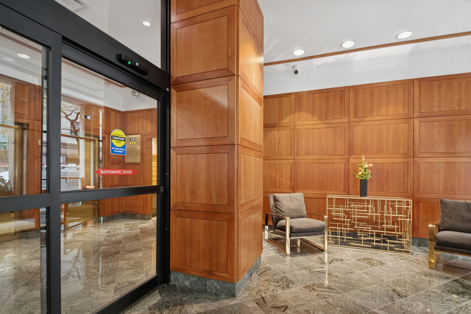 100 East Walton Street, Unit 18D Chicago, IL 60611 - Photo 19 of 20 a bathroom with a shower and a sink