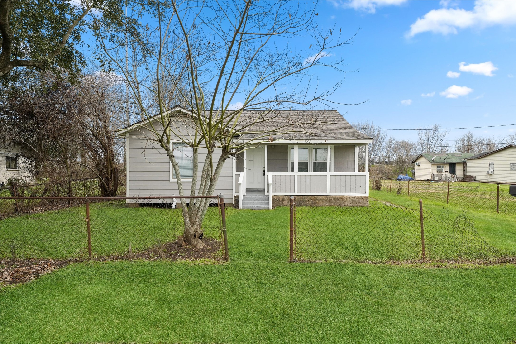 1107 Defender Street Houston, TX 77029 - Photo 2 of 26 a view of a house with a backyard