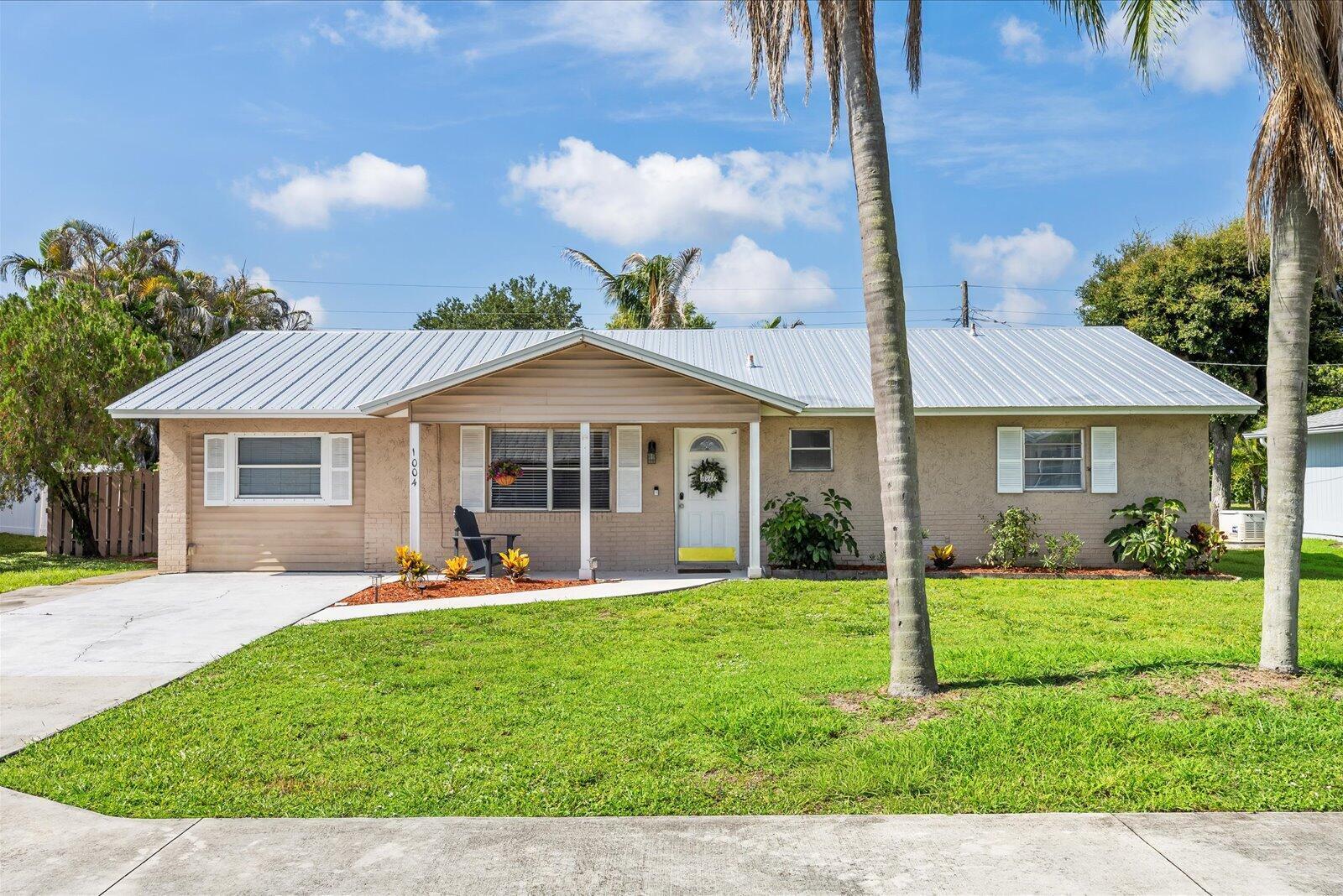 1004 Northwest 16th Place Stuart, FL 34994 - Photo 2 of 42 02_beyc6a3d80536f41a