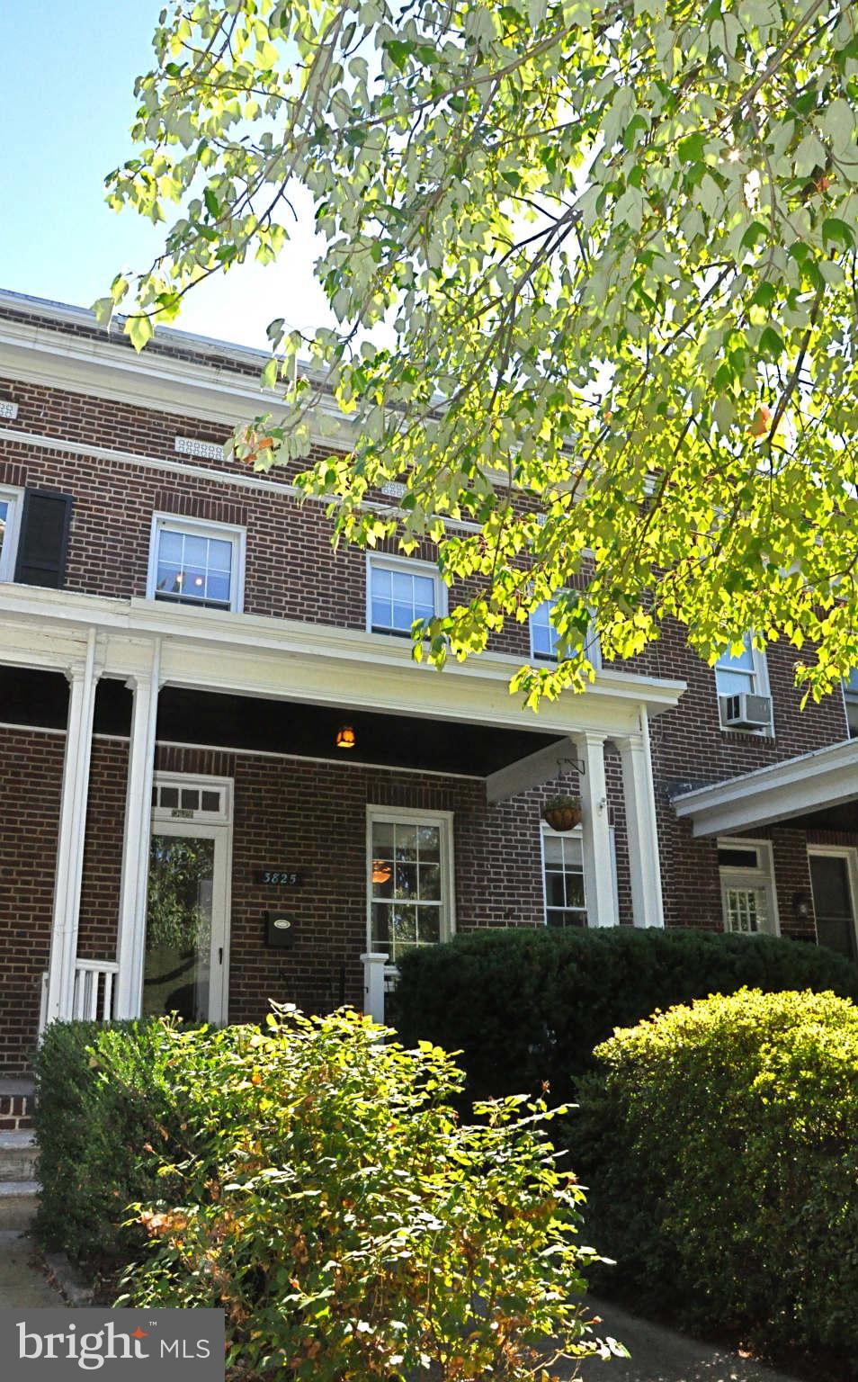 3825 Keswick Road Baltimore, MD 21211 - Photo 1 of 30 a front view of a house with a yard